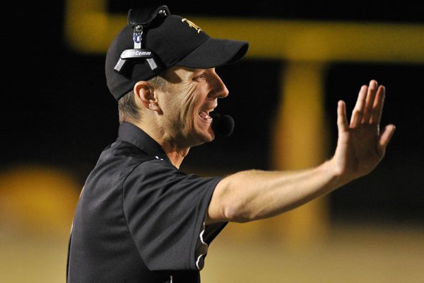 In this Oct. 14, 2011, file photo, Pulaski Robinson head football coach Todd Eskola shouts instructions to his players during a game against DeQueen. Eskola said junior running back T.J. Hammonds is a Division I prospect.