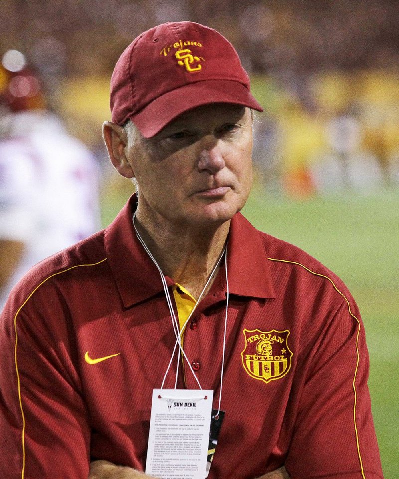 FILE - In this Sept. 28, 2013, file photo, Southern California athletic director Pat Haden is shown after USC lost to Arizona State in an NCAA college football game in Tempe, Ariz. The Pac-12 Conference has fined Haden $25,000 for coming down to the field at Stanford Stadium on Saturday, Sept. 6, 2014, and confronting game officials. Pac-12 Commissioner Larry Scott said in a statement Monday, Sept. 8,  that Haden's conduct was inappropriate. (AP Photo/Rick Scuteri, File)