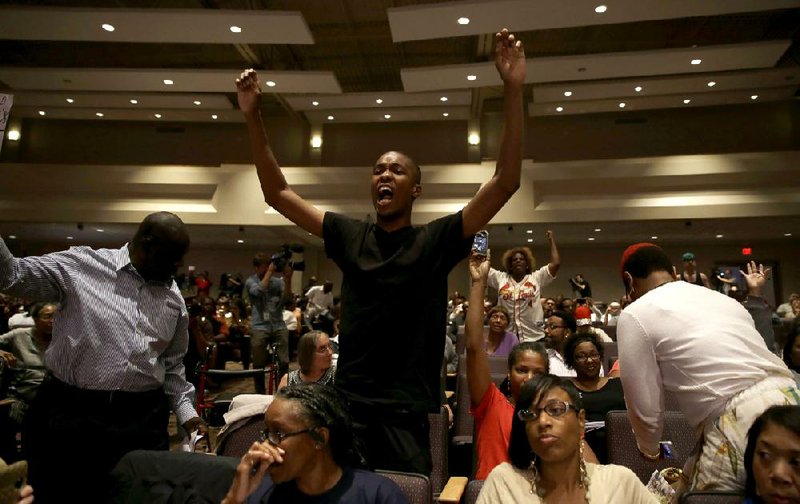 Emotions ran high for some people during Tuesday’s meeting of the City Council in Ferguson, Mo.