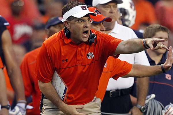 Auburn head coach Gus Malzahn reacts to a call by officials during the first half of an NCAA college football game against San Jose State on Saturday, Sept. 6, 2014, in Auburn, Ala. (AP Photo/Butch Dill)