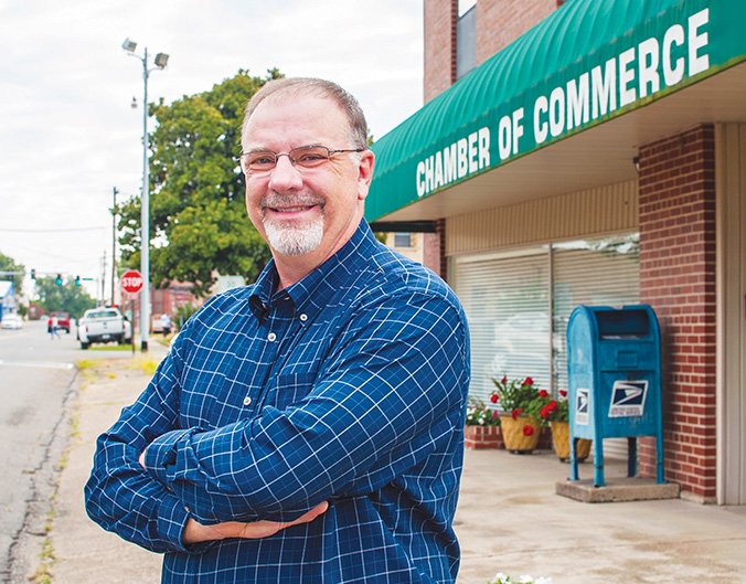 Rick McClure stands outside the Malvern/Hot Spring County Chamber of Commerce, which he serves as treasurer.