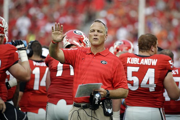 Georgia head coach Mark Richt calls out from the sideline in the first half of an NCAA college football game against Clemson, Saturday, Aug. 30, 2014, in Athens, Ga. (AP Photo/David Goldman)