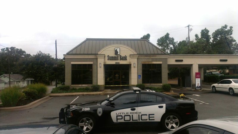 Little Rock Police Department officials respond to a Thursday afternoon bank robbery at the Summit Bank located at 1800 N. Taylor St.