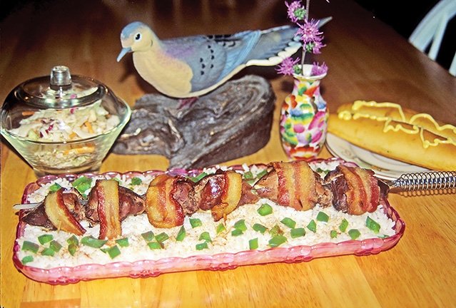 Bacon-wrapped dove breasts are favorites of many hunters who pursue mourning doves each year 
in Arkansas.