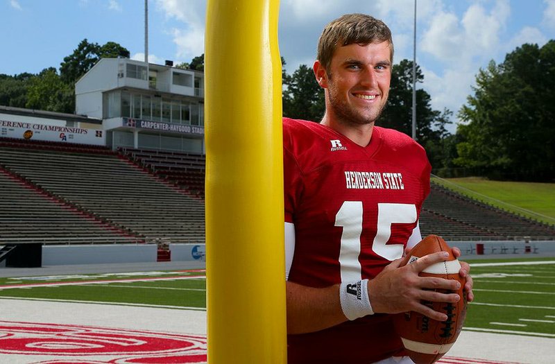 9/10/14
Arkansas Democrat-Gazette/STEPHEN B. THORNTON
Henderson State quarterback Kevin Rodgers, who is about to set the state's all-time passing record.
