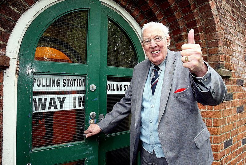 FILE - In this May 6, 2010 file photo former Democratic Unionist Party leader Ian Paisley gestures. Paisley the fiery Protestant leader has died in Northern Ireland aged 88  his wife Eileen said Friday Sept. 12, 2014. Much like the Ulster weather, Ian Paisley could offer beaming sunshine one minute, stinging hailstones the next. The international image of Paisley _ that of Northern Ireland's most dangerous demagogue, a belligerent bigot committed to keeping Irish Catholics at bay and out of power _ was well-documented in its own right. But understanding the worst of the public Paisley wouldn't prepare you for meeting him in the flesh. (AP Photo/PA, Paul Faith) UNITED KINGDOM OUT NO SALES NO ARCHIVE