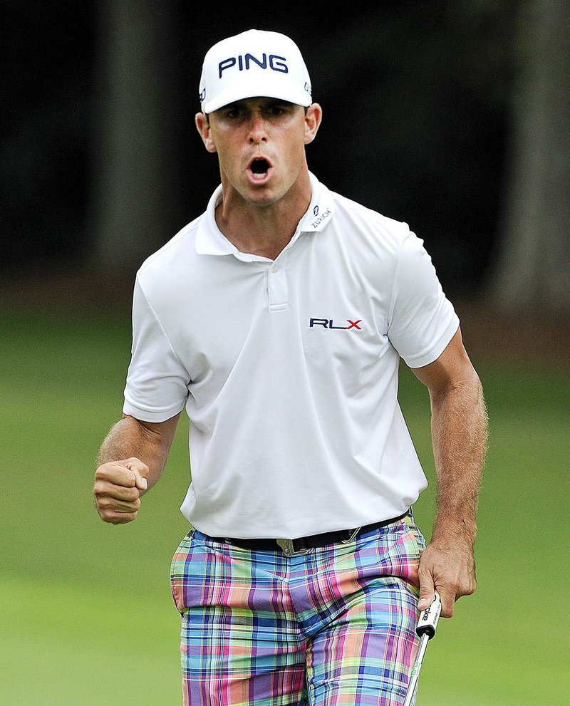 Billy Horschel reacts after making a putt to save par on the 17th hole during the final round of play in the Tour Championship golf tournament  Sunday, Sept. 14, 2014, in Atlanta. Horschel won the tournament and the Fed X Cup. (AP Photo/John Amis)