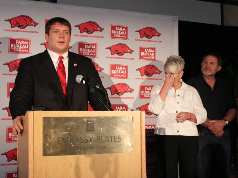 Senior Luke Charpentier speaks Monday after accepting the first scholarship from the Garrett Uekman Foundation while Ueckman's parents look on.