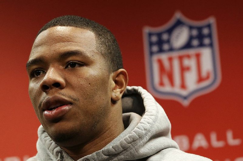 FILE - In this Jan. 16, 2013, file photo, Baltimore Ravens running back Ray Rice speaks during a news conference at the team's practice facility in Owings Mills, Md. At least four television networks say they plan to stop or minimize airings of video showing football player Rice striking his fiancee, footage that has called into question how the NFL disciplines players involved in domestic violence. The video from a casino elevator showing Janay Palmer crumbling to the floor after a punch has already been seen many times on TV since TMZ released it Monday, Sept. 8, 2014. (AP Photo/Patrick Semansky, File)