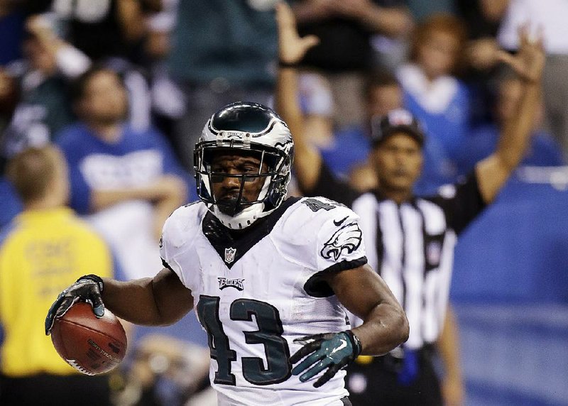 Philadelphia Eagles' Darren Sproles (43) reacts after scoring on a 19-yard touchdown run during the second half of an NFL football game against the Indianapolis Colts Monday, Sept. 15, 2014, in Indianapolis. (AP Photo/AJ Mast)