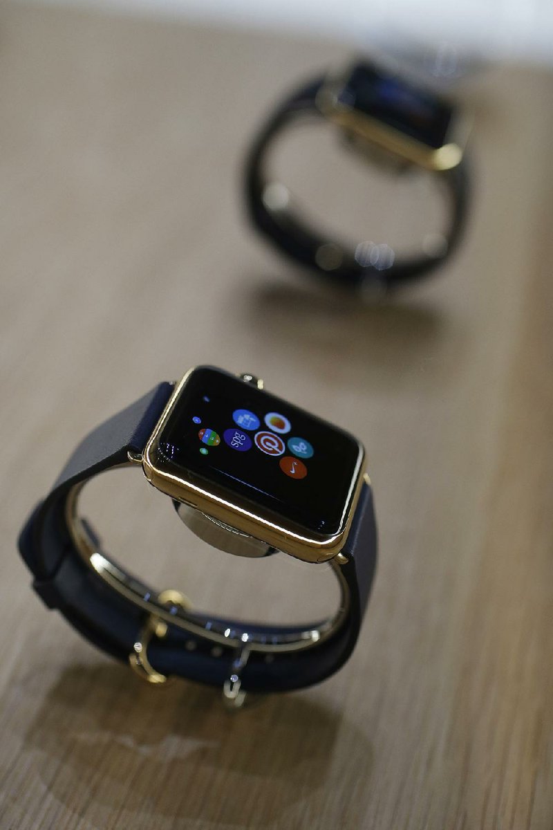 The Apple Watch is displayed on Tuesday, Sept. 9, 2014, in Cupertino, Calif. (AP Photo/Marcio Jose Sanchez)