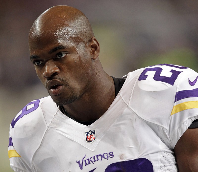 The Associated Press UNDER FIRE: The Minnesota Vikings' decision to activate Adrian Peterson for Sunday's game against the New Orleans Saints comes under fire from state offiicials and corporate sponsors after the All-Pro running back was indicted by a Texas grand jury on a charge of child abuse.