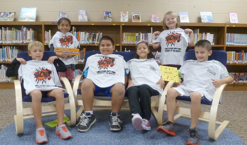 Submitted Photo Glenn Duffy Elementary PAWS Students of the Month for September are: Hudson Harris of Decatur, Jonny Pollard of Gravette, Anahi Gonzales of Gravette, Cameron Bedwell of Gravette, Yaritza Lopez of Gravette and Allie Cook of Gravette. PAWS Student of the Month T-shirts are sponsored by the Glenn Duffy Elementary PTO. &#8220;Pawsitive&#8221; and Wise Students are chosen during the school year at Glenn Duffy Elementary School. The PAWS program incorporates character education and positive behavior into the school community. Each month PAWS skills are chosen and discussed in classroom guidance in relation to character education. Respect is the word for the month of September and is defined as being polite and considerate of others. PAWS awards are given in the classroom, hallway and cafeteria as an incentive for students to practice the PAWS skill for the month. Students are recognized at monthly Rise and Shine assemblies.