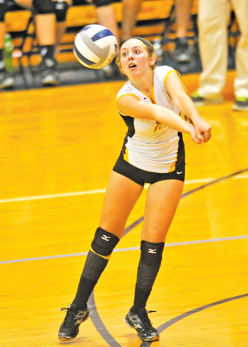  Staff Photo Michael Woods Landry Laird of Prairie Grove returns the ball during the game against Shiloh Christian in Springdale on Sept. 9.