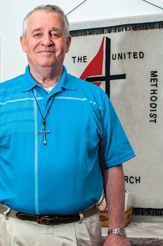 The Rev. Rick Wilkins stands in the sanctuary of First United Methodist Church in Mayflower, where he is the pastor, as he prepares to work on disaster relief. He is the chairman of Interfaith Partners Disaster Alliance, made up of seven churches. The alliance and the Vilonia Disaster Recovery Alliance are working with the national organization World Renew to set up walk-in centers, beginning Sept. 29, in the two cities to help victims of the area’s April tornado.