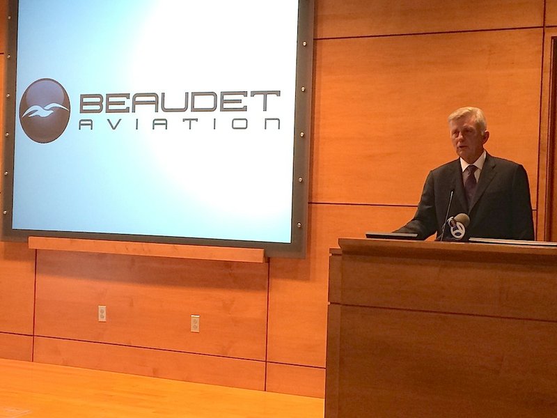 Gov. Mike Beebe on Wednesday, Sept. 17, 2014, announces plans by Beaudet Aviation, a subsidiary of JCB Aero, to add a facility near the Bill and Hillary Clinton National Airport in Little Rock to supply Dassault Falcon Jet with completion work for its Falcon models.