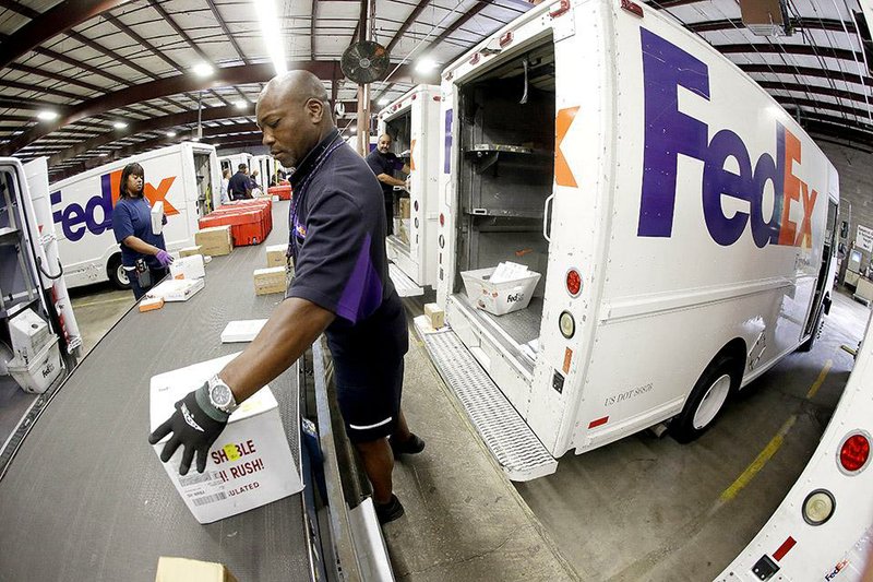 FedEx to add 50,000 for year's end
