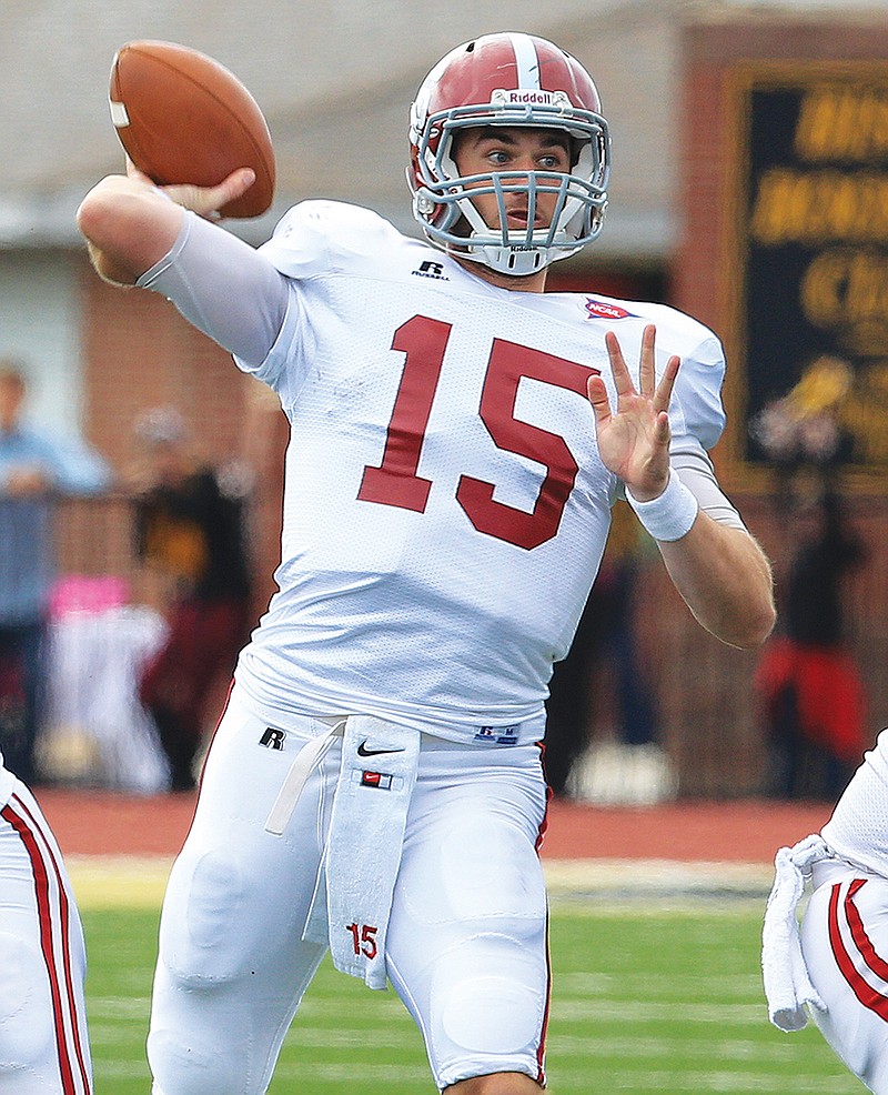 Arkansas Democrat-Gazette/Staton Briedenthal RECORD IN SIGHT: Henderson State senior quarterback Kevin Rodgers, pictured before the Reddies’ 2013 road win over Harding, needs just 106 yards to become the all-time leader for career passing yards in Arkansas collegiate football, surpassing the 10,758 yards of Arkansas’ State Ryan Aplin. The Reddies, ranked No. 7 in the American Football Coaches Association NCAA Division II top 25, play their home opener tonight against Southeastern Oklahoma State at Carpenter-Haygood Stadium in Arkadelphia.