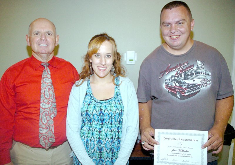 RICK PECK MCDONALD COUNTY PRESS McDonald County High School Principal Greg Leach presented his Employees of the Month at the recent board of education meeting. From left to right: Leach, Joelle Stark, biology teacher, and James Wahleithner, maintenance.