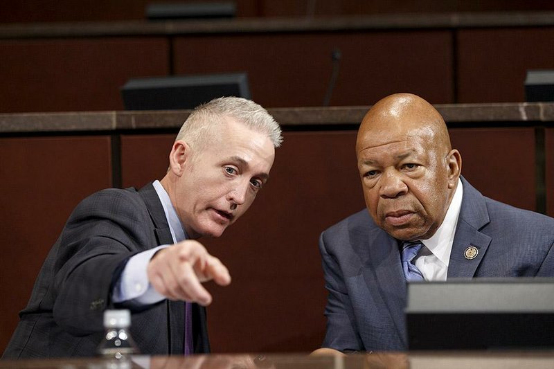 Rep. Trey Gowdy (left), R-S.C., chairman of the House Select Committee on Benghazi, and Rep. Elijah Cummings, D-Md., the ranking member, confer Wednesday as the panel holds its fi rst public hearing to investigate the 2012 attacks on the U.S. consulate in Benghazi, Libya.