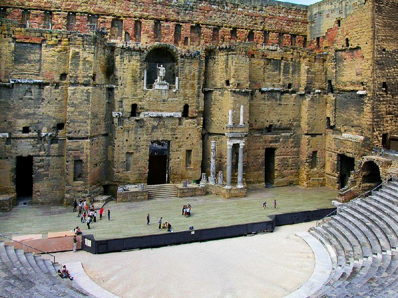 Even though its marble facing is long gone, the stage wall of Orange’s Roman theater provides wonderful acoustics for an outdoor setting.