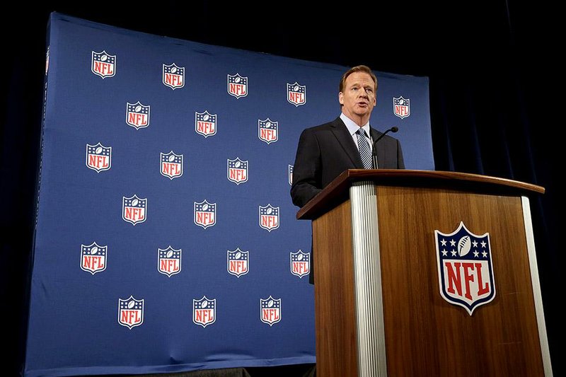 NFL commissioner Roger Goodell talks during a news conference addressing the rash of NFL players involved in domestic violence, Friday, Sept. 19, 2014, in New York. (AP Photo/Julio Cortez)