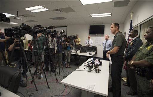 Gilchrist county sheriff Bobby Schultz talks with the media following the shooting deaths of 8 members of a family in  Bell, FL, Thursday, Sept., 18, 2014. Schultz said a man killed six of his grandchildren, his adult daughter and himself.  