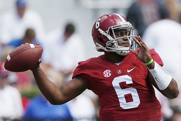 Alabama quarterback Blake Sims throws a pass as he warms up before an NCAA college football game against Florida, Saturday, Sept. 20, 2014, in Tuscaloosa, Ala. (AP Photo/Brynn Anderson)