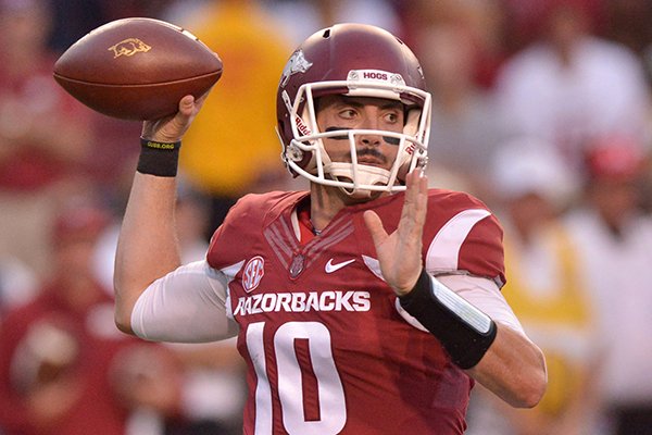 Arkansas quarterback Brandon Allen throws a pass during the second quarter of a game against Northern Illinois on Saturday, Sept. 20, 2014 at Razorback Stadium in Fayetteville. 
