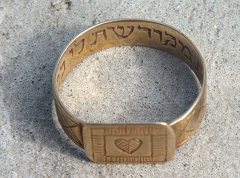 This photo taken in Sept. 2014, and released by the Yad Vashem International Institute for Holocaust Research shows a ring discovered near recently discovered gas chambers at the Nazi-era death camp of Sobibor in Sobibor, Poland. Polish and Israeli Holocaust researchers announced Wednesday, Sept. 17, 2014, that they have discovered the exact location of the building that housed gas chambers at the camp. (AP Photo/Yoram Haimi, Yad Vashem International Institute for Holocaust Research)