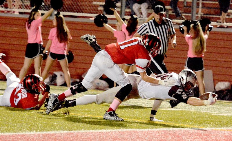 Bud Sullins/Special to Siloam Sunday Siloam Springs senior wide receiver Parker Baldwin dives for the endzone to score a touchdown in the third quarter of Siloam Springs&#8217; 44-7 win against Claremore, Okla., on Friday at Lantow Field.