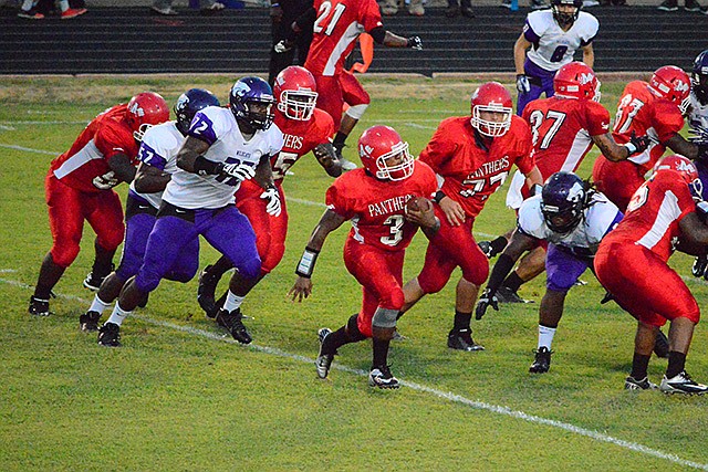 Magnolia senior running back Justin Dockery gets good blocking from his offensive line while trying to turn the corner. The Panthers trailed El Dorado 7-6 in the fourth quarter but lost 21-12 Friday night during the final nonconference game of the season.