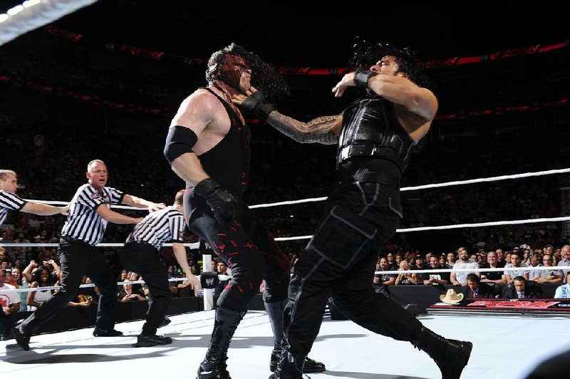 Roman Reigns vs. Kane.