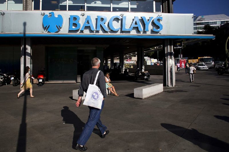 Pedestrians pass a Barclays PLC bank branch in Madrid in July. Barclays, Britain’s second-largest lender, has been fined for failing to properly segregate billions of dollars in client assets.