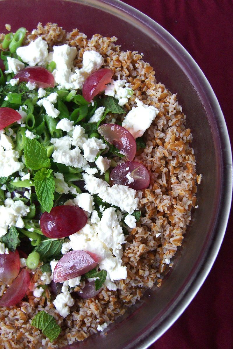 Bulgur Salad With Red Grapes and Feta combines nutty cracked wheat, sweet red grapes, feta cheese, green onions and mint.