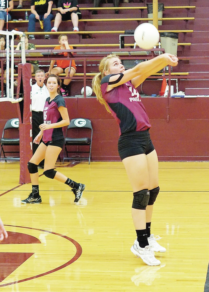 Photo by Randy Moll Lady Pioneer Haley Borgeteien-James hits one over the net during play against the Prairie Grove Lady Tigers on Sept. 16 at Gentry High School. The Gentry girls lost the match, 3-0, with set scores of 25-13, 25-18 and 25-16.