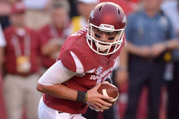 Arkansas quarterback Brandon Allen holds on to the ball during a game Saturday, Sept. 20, 2014 at Razorback Stadium in Fayetteville. 