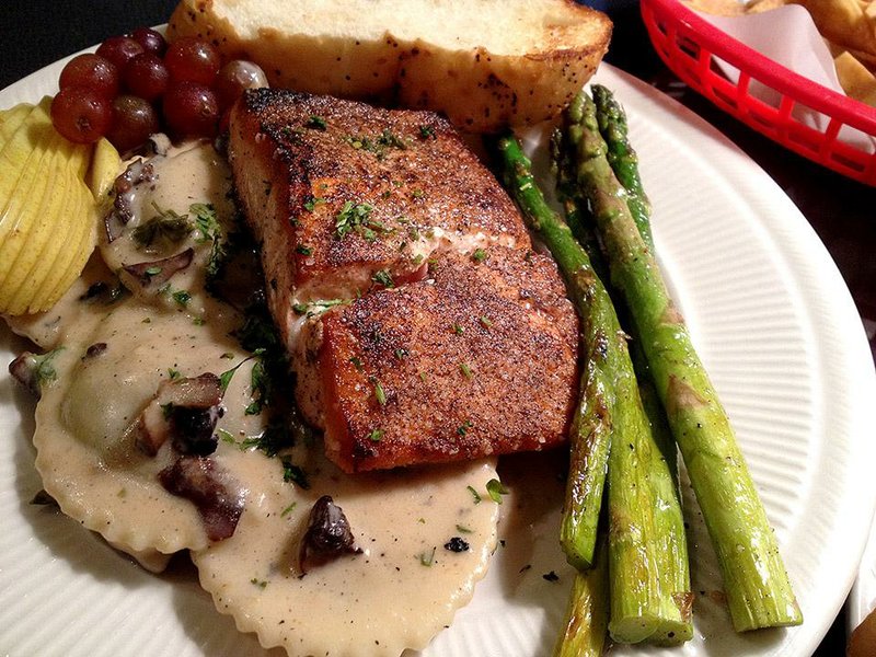 Salmon With Wild Mushroom Ravioli is among a dozen or so Garden Bistro dinner entrees.