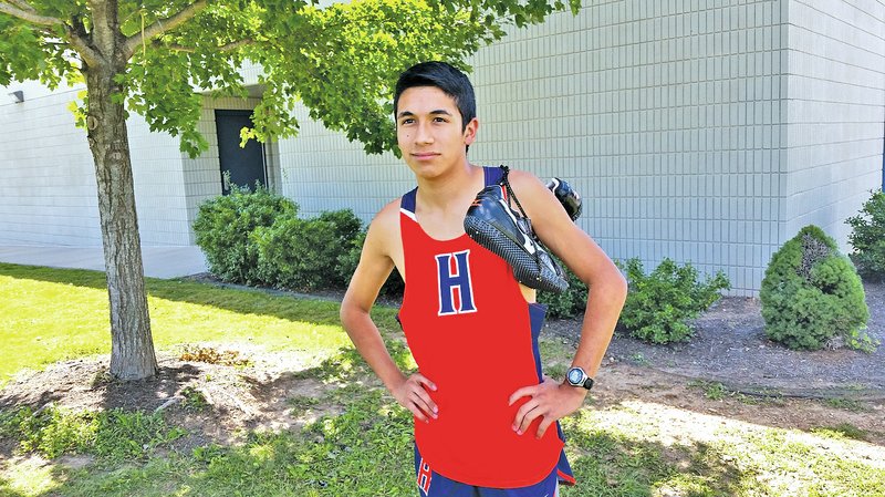 Staff photo PAUL BOYD David Martinez, Rogers Heritage junior, clocked a personal best 5K time of 17 minutes, 7.43 seconds on Saturday at the Missouri Southern Stampede in Joplin, Mo.