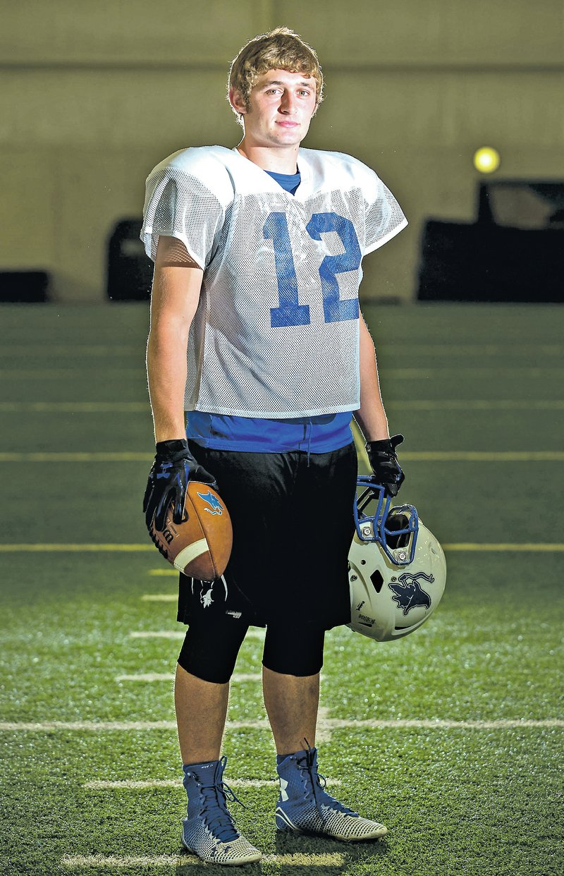  STAFF PHOTO JASON IVESTER Sage White, Rogers High junior running back, sas rushed for 133 yards and is averaging seven yards a carry for the Mounties.