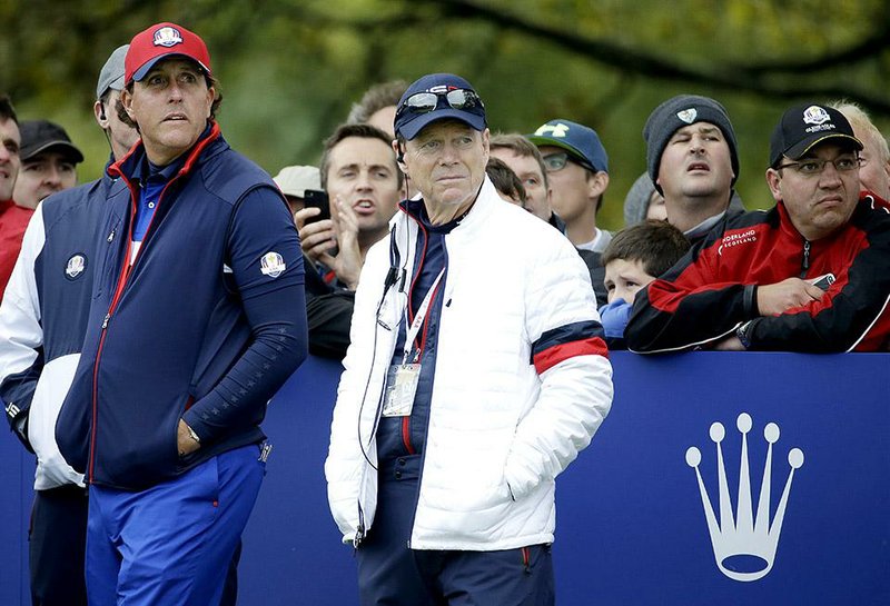 US team captain Tom Watson and Phil Mickelson, left, stand on the 11th tee box during a practice round ahead of the Ryder Cup golf tournament at Gleneagles, Scotland, Thursday, Sept. 25, 2014. (AP Photo/Matt Dunham)