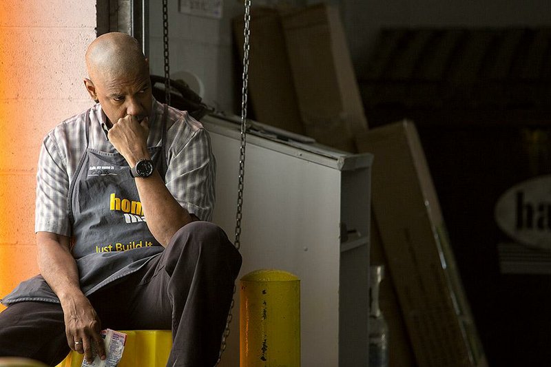 Robert McCall (DENZEL WASHINGTON) takes a break while working at Home Mart in Columbia Pictures' THE EQUALIZER.