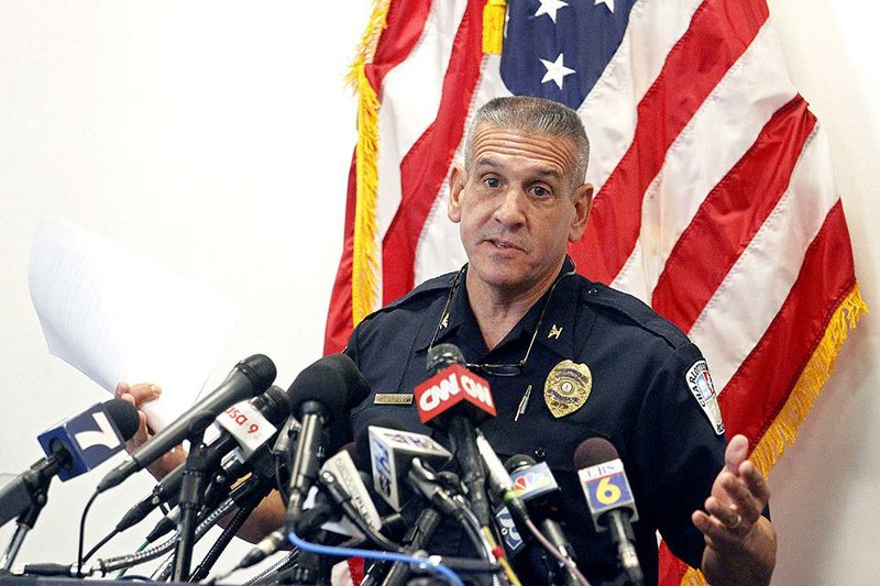 Charlottesville Police Chief Timothy J. Longo answers questions during a news conference in Charlottesville, Va. on Thursday, Sept. 25, 2014 about the case of Hannah Elizabeth Graham, 18, a University of Virginia student who went missing on Sept. 13. Longo said the search for Graham is expanding to rural areas outside the college town of 40,000. (AP Photo/The Daily Progress, Ryan M. Kelly)