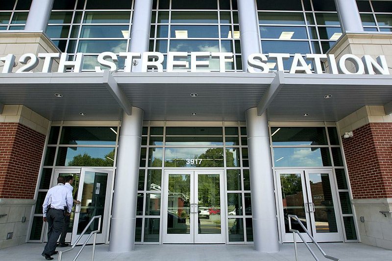 Arkansas Democrat-Gazette/BENJAMIN KRAIN --09/25/2014--
Community members and City of Little Rock officials held a ceremony Thursday to celebrate the grand opening of the 12th Street police station which is part of the revitalization effort for the 12th Street Corridor. 