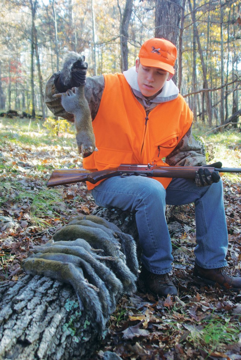 Zach Sutton has a morning’s bag of bushytails. “I enjoyed being outside exploring new places,” he said.