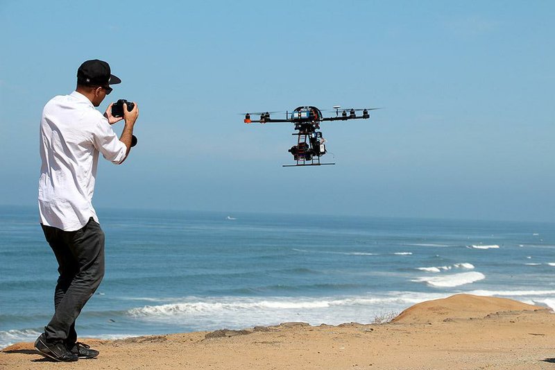 An eight-rotor Sky Jib helicopter hovers above a San Diego beach in 2013 in this photo provided by Aerial MOB, one of six companies granted waivers by the FCC to use drones for filming movies.