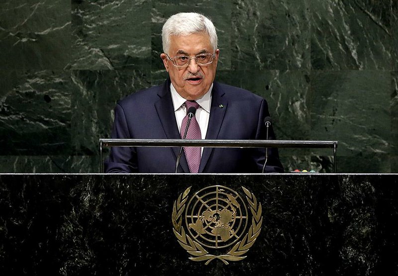 President Mahmoud Abbas, of Palestine, addresses the 69th session of the United Nations General Assembly, at U.N. headquarters, Friday, Sept. 26, 2014. (AP Photo/Richard Drew)