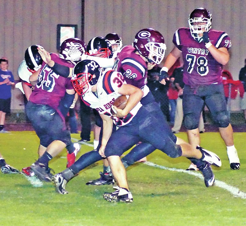 Staff Photo Randy Moll Garrett Easterling, Pea Ridge senior, finds a hole and runs downfield Friday against Gentry Pioneers at Pioneer Stadium in Gentry.