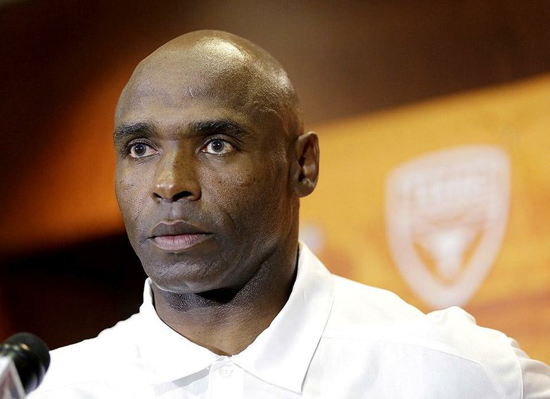 Texas head football coach Charlie Strong talks to the media during his weekly news conference, Monday, Sept. 22, 2014, in Austin, Texas. (AP Photo/Eric Gay)