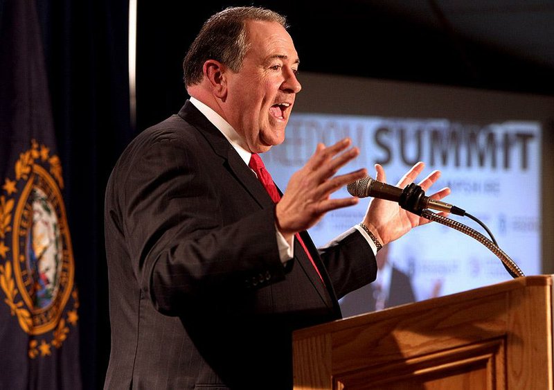 Former Arkansas Gov. and Republican presidential candidate Mike Huckabee speaks at a GOP Freedom Summit, Saturday, April 12, 2014, in Manchester, N.H. Several potential Republican White House contenders _ among them Kentucky Sen. Rand Paul, Cruz, and former Arkansas Gov. Mike Huckabee _ headline a conference Saturday in New Hampshire, hosted by the conservative groups Citizens United and Americans for Prosperity. (AP Photo/Jim Cole)